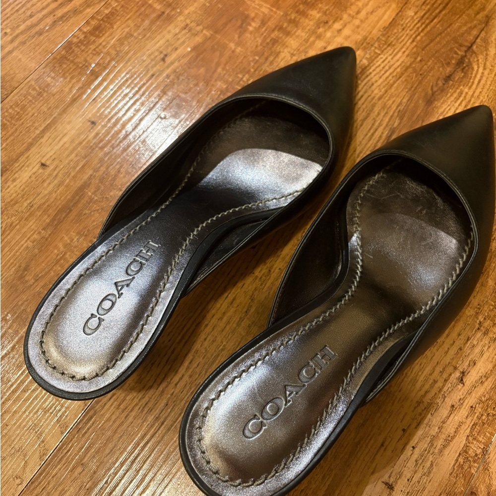 Coach Black Mules Sleek Leather Design in great used condition